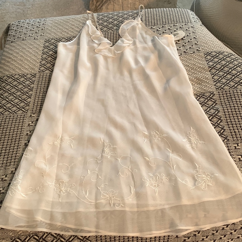 Women’s Robe with matching Night Gown. Color is ivory.